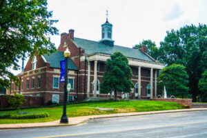 Criminal defense attorney in St. Louis and Chesterfield, MO reviewing Missouri harassment statute during trial.